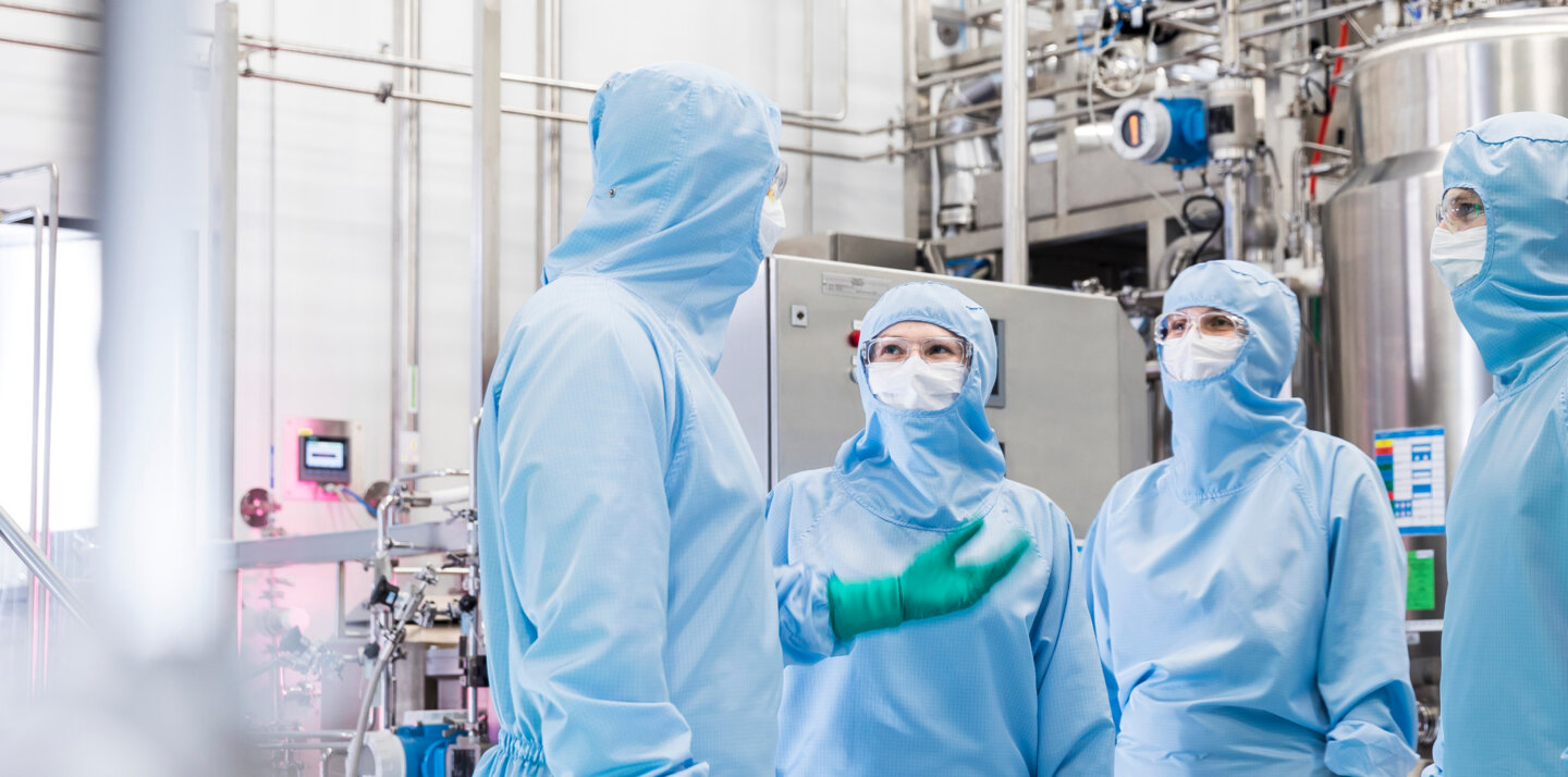 A drug lab staff talking. A drug lab staff talking.