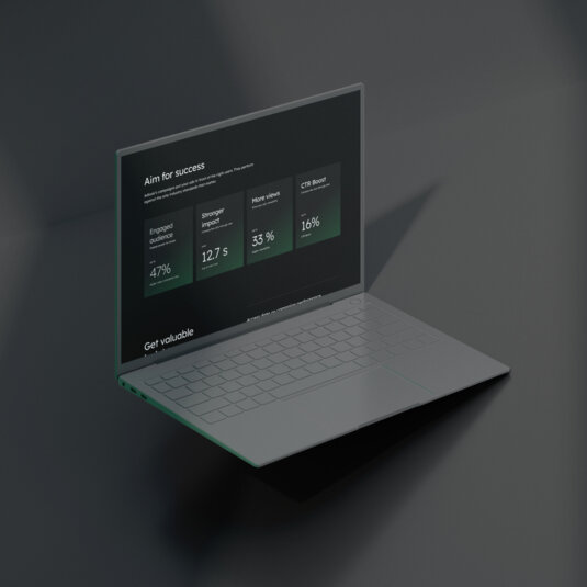 A grey laptop with Adlook's page open. A grey laptop with Adlook's page open.