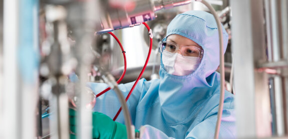 Woman working in a pharmaceutical lab. Woman working in a pharmaceutical lab.