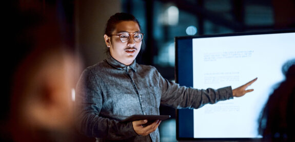 Software engineer presenting his work. Software engineer presenting his work.