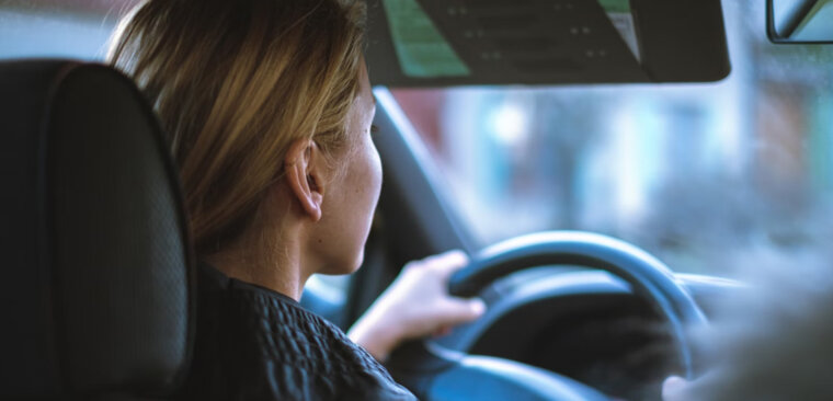 Woman driving a car. Woman driving a car.